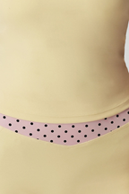 Conjunto Clio de camiseta de tirantes y pantalón acampanado de lunares