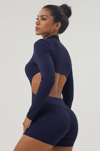 Tuta intera Tamsin a maniche lunghe con mezza zip