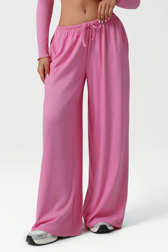 Pantaloni Jade a gamba larga e vita bassa