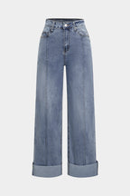 Paçaları kıvrılmış geniş paçalı kot pantolon