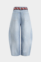 Dikkat Çekici Aksesuar: Geniş Paçalı Kot Pantolon