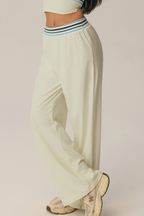 Pantaloni svasati Positano con fascia a righe