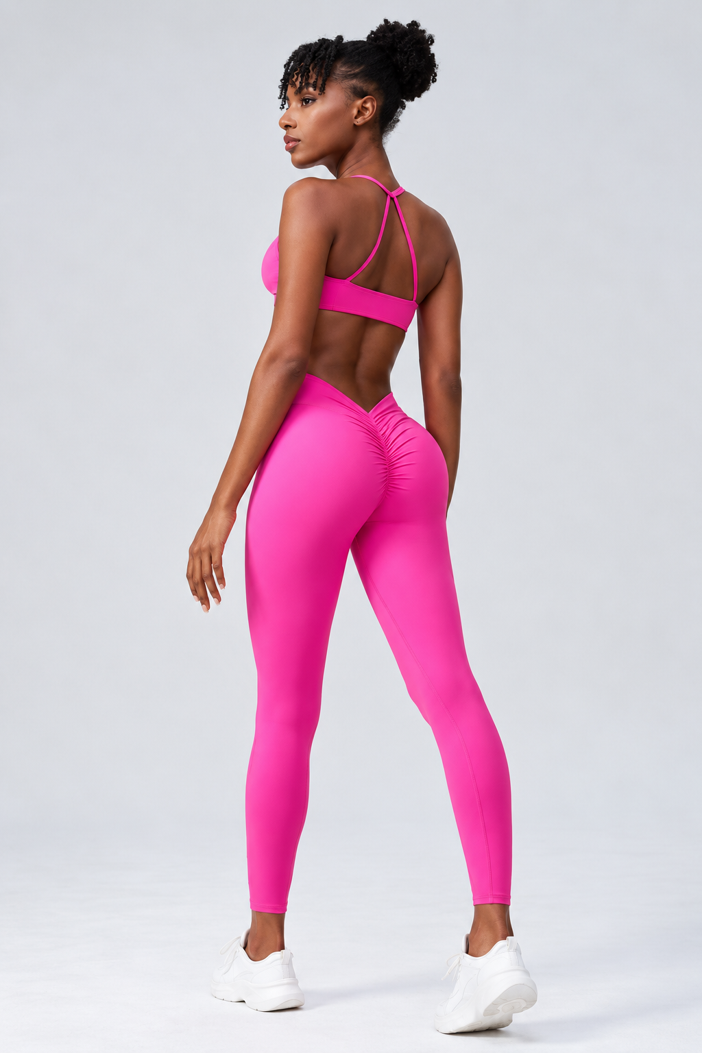 Completo Ava con top annodato e leggings drappeggiati