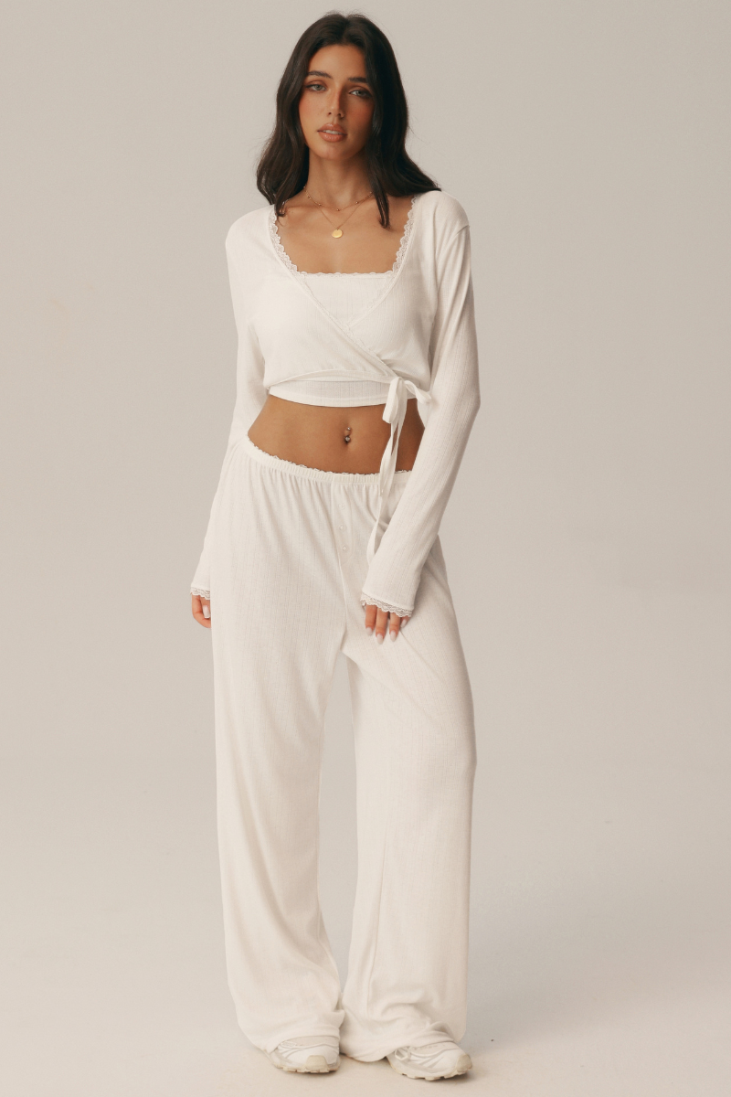 Completo 3 pezzi Giselle: reggiseno, top incrociato e pantaloni ampi