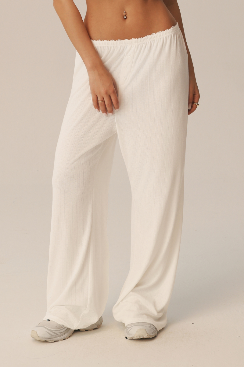 Pantaloni ampi Giselle con fascia in pizzo